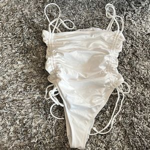 White one-piece bathing suit from Urban Outfitters